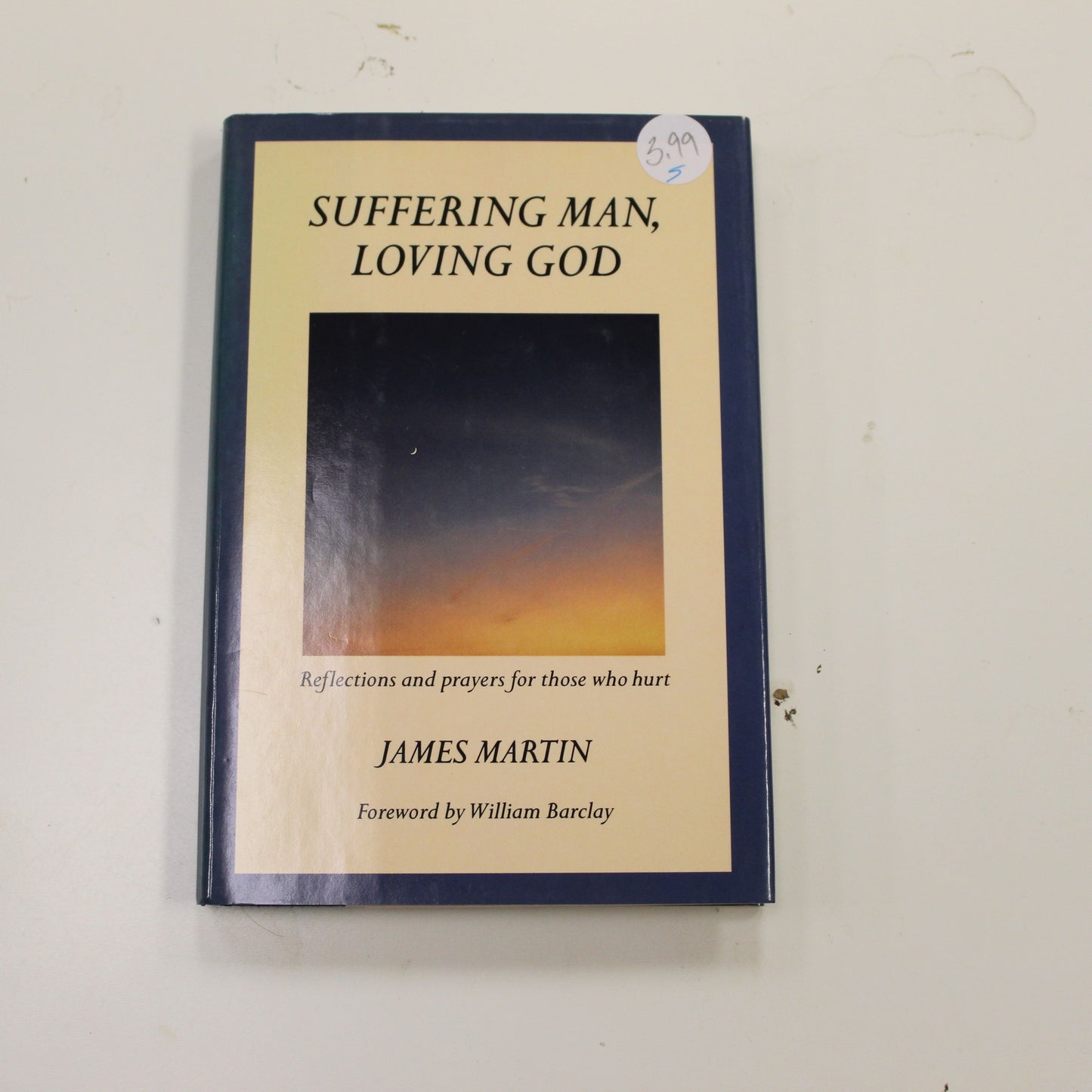 SUFFERING MAN, LOVING GOD